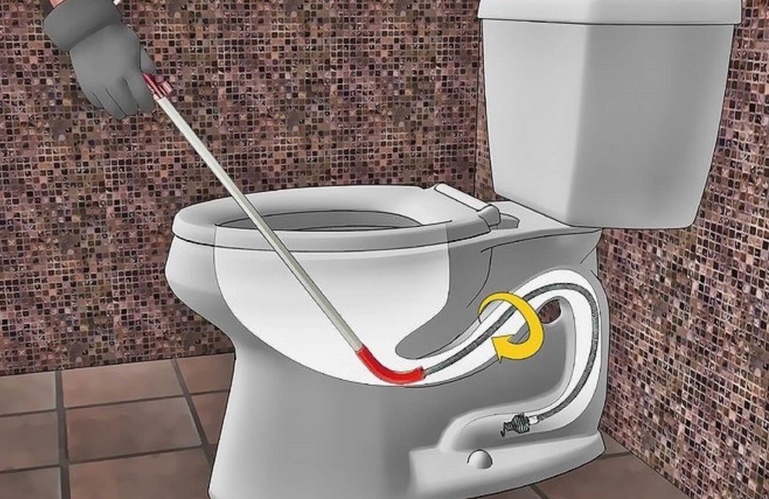 Sử dụng dây lò xo thông tắc bồn cầu (cây thông bồn cầu)